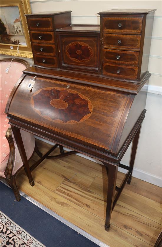 An Edwardian inlaid mahogany bonheur du jour W.76cm